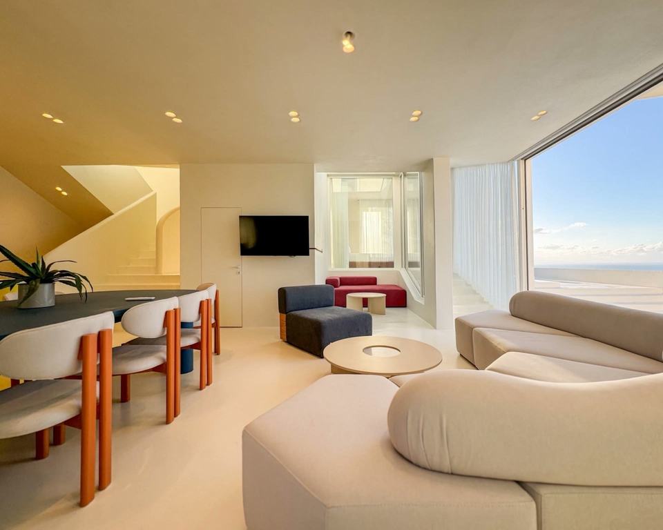 Escape Villa II interior opening toward a panoramic view