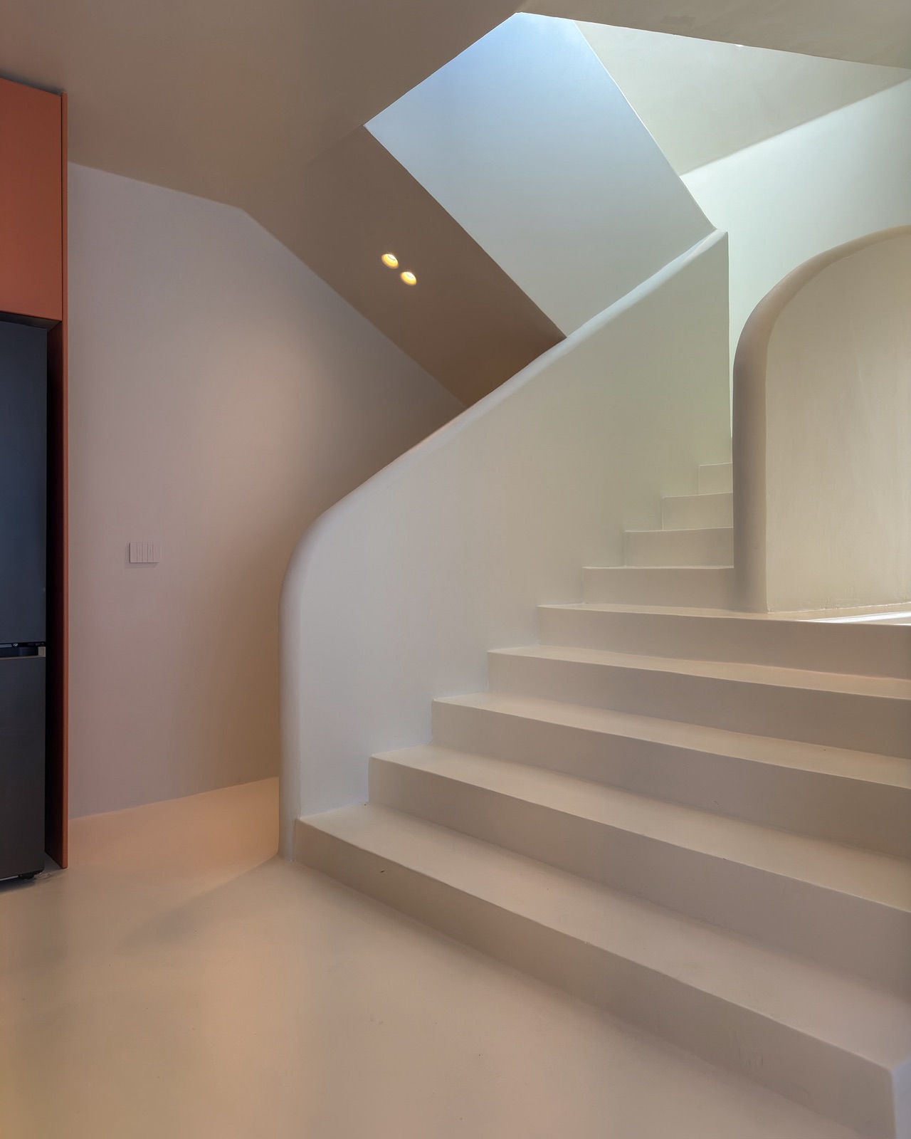 Curved stair and skylight detail at Escape Villa II by Habitat Architecture